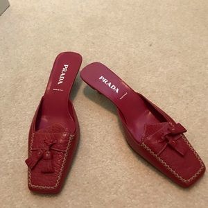 Prada mules  Red.  Never worn